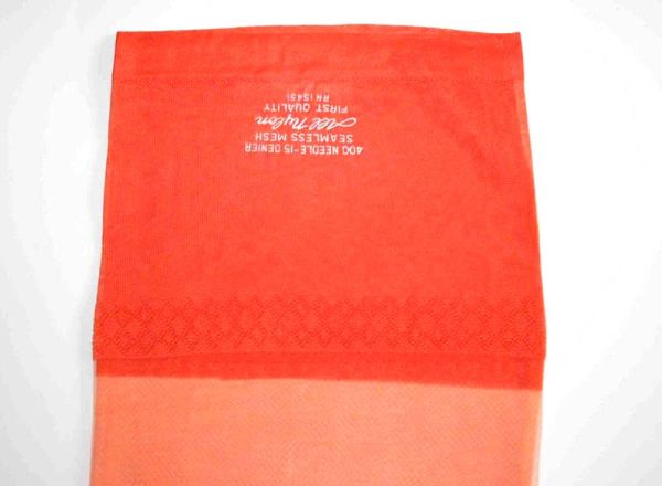 Alte US Nylonstruempfe Orange Gr. 10
